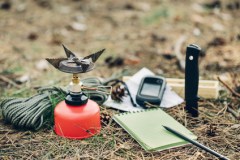 Emergency preparation equipment on the grass, on the nature background