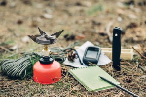 Emergency preparation equipment on the grass, on the nature background